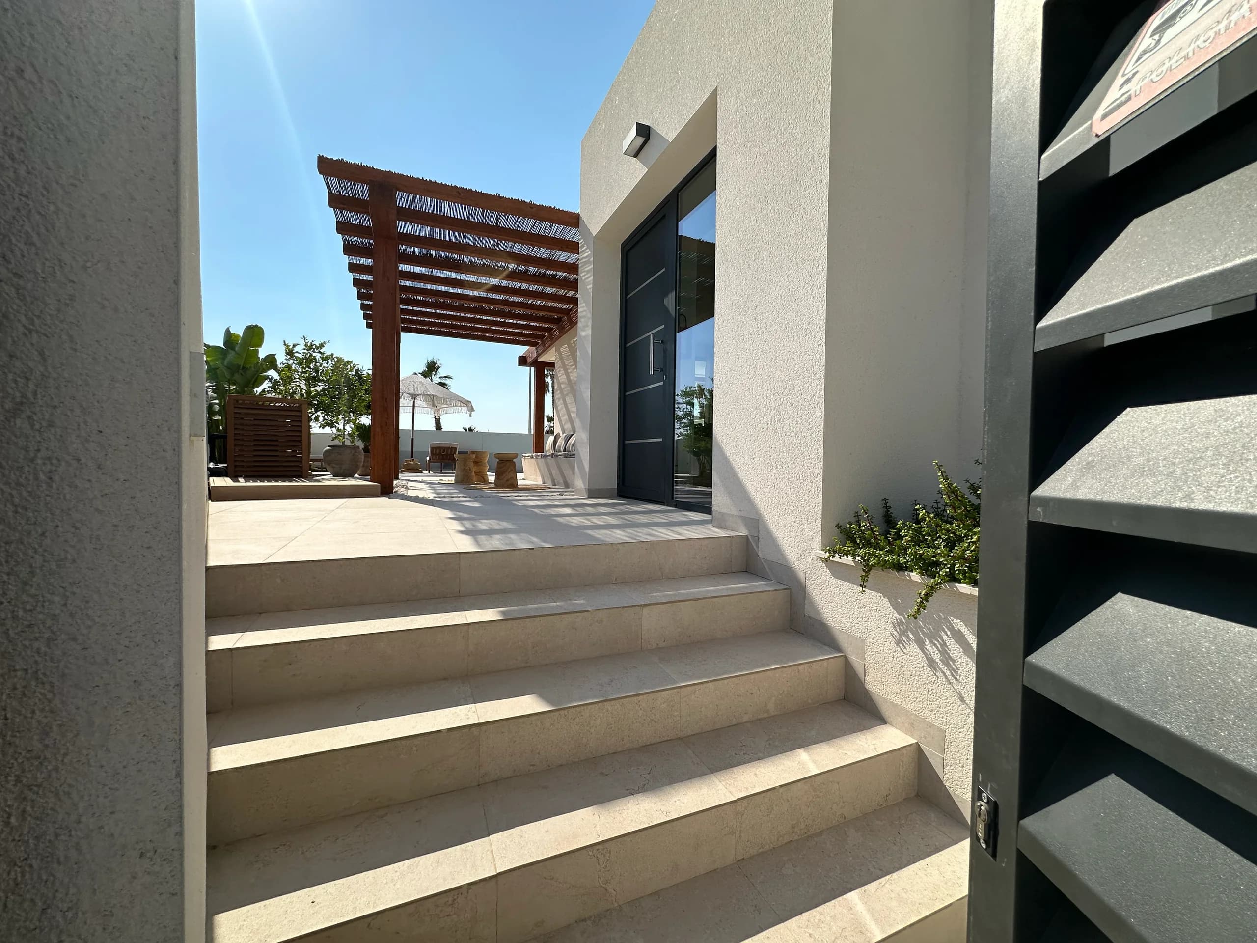 Villa Bella Sol — outdoor dining area with views of the villa