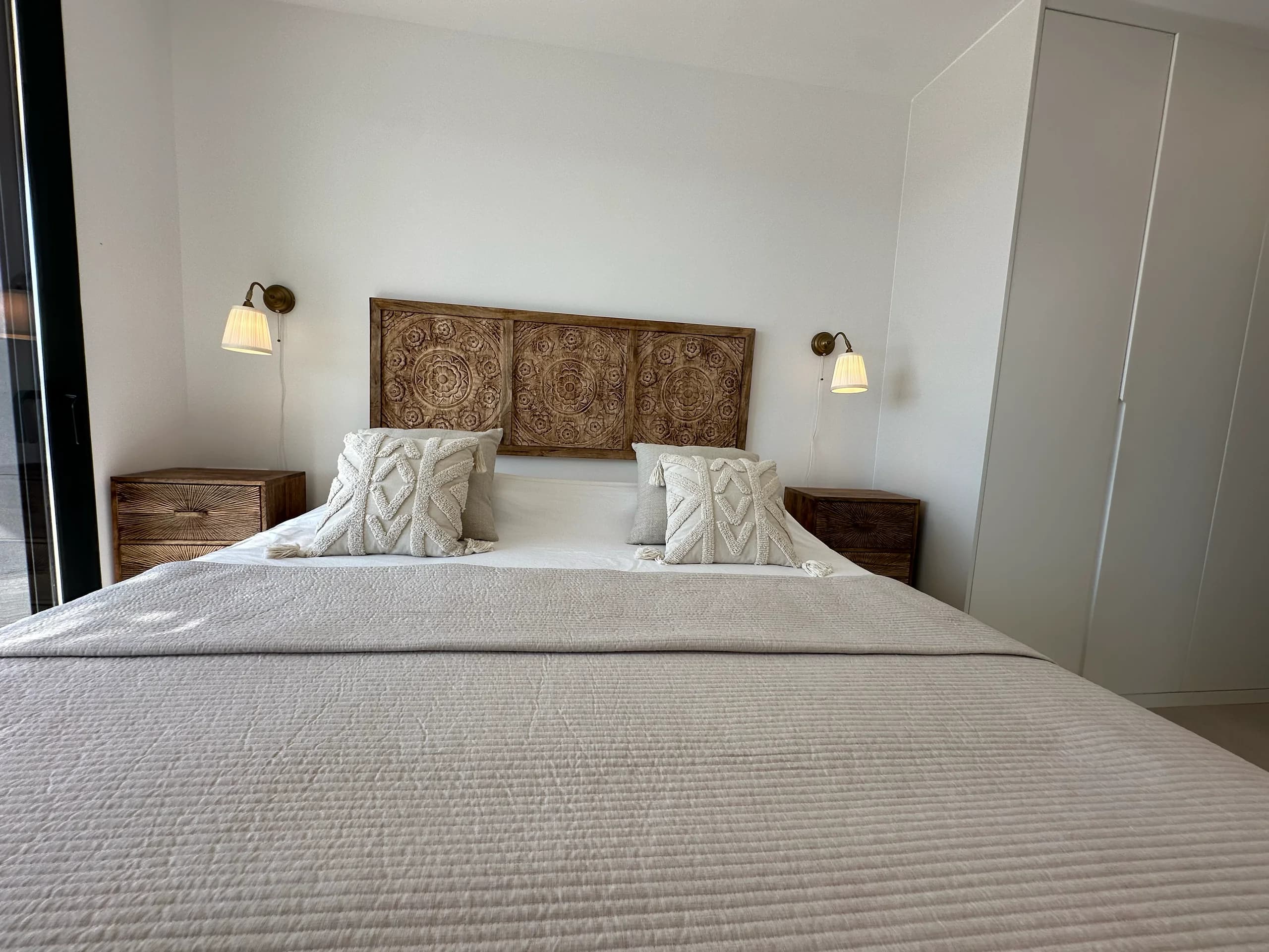 Villa Bella Sol — bedside detail with nightstand and lamp